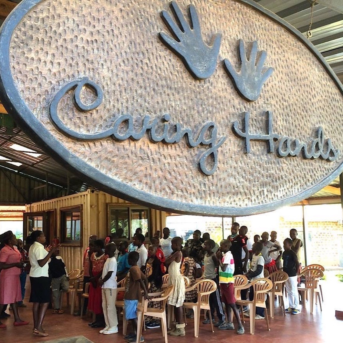 Caring Hands sign